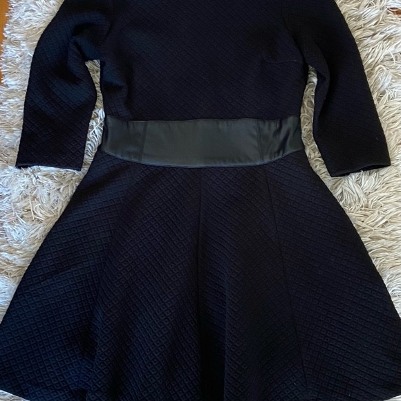 Black dress. Great swing on the bottom. Leather waistband - Picture 3 of 3